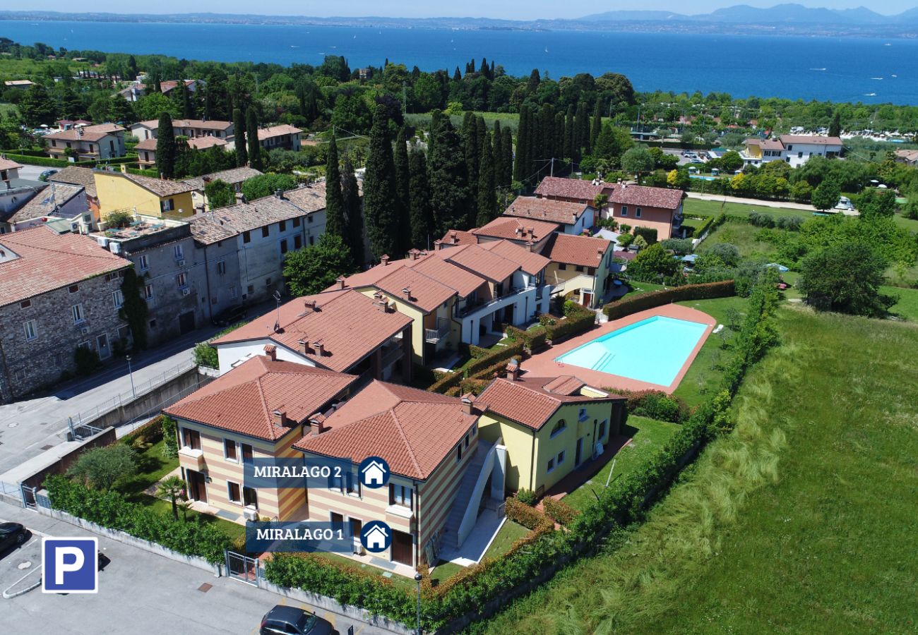 Appartamento a Lazise - Regarda - appartamento Miralago 2 con piscina e vista lago,  parcheggio biciclette