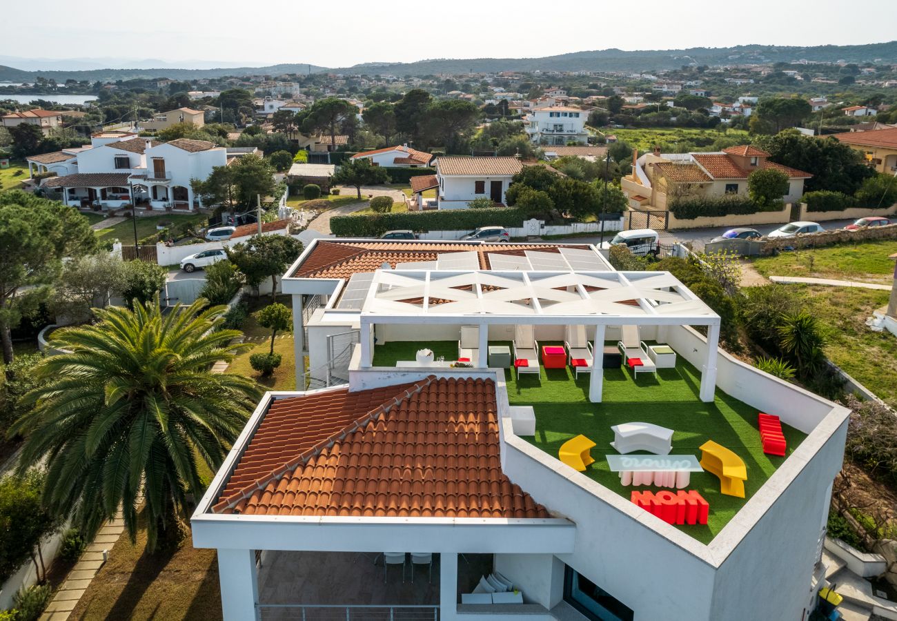 WLofts 14 - Terrasse mit Pergola und Sonnenliegen, perfekt für Entspannungsmomente