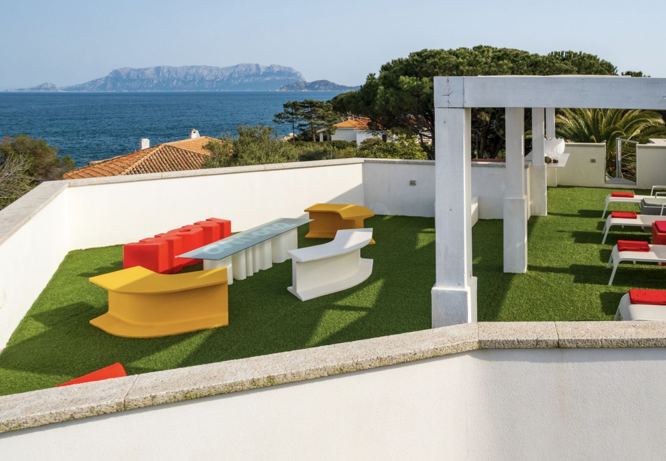 WLofts 14 - Terrasse mit atemberaubendem Meerblick, perfekt für Sonnenuntergangsmomente während Ihres Urlaubs auf Sardinien