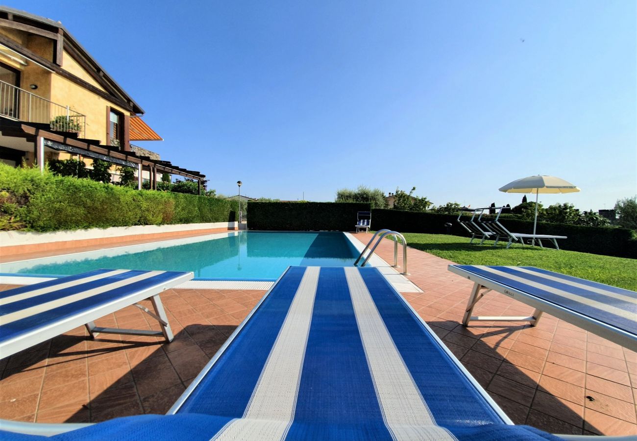 Ferienwohnung in Lazise - Regarda - Wohnung Blanco mit wunderschöner  Seeblick und Pool