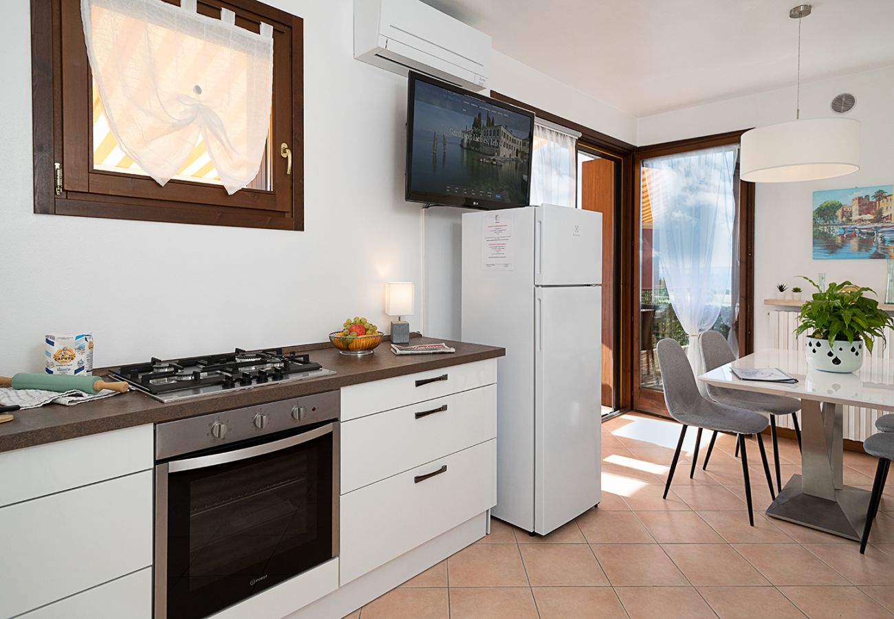 Ferienwohnung in Lazise - Regarda - Wohnung Blanco mit wunderschöner  Seeblick und Pool