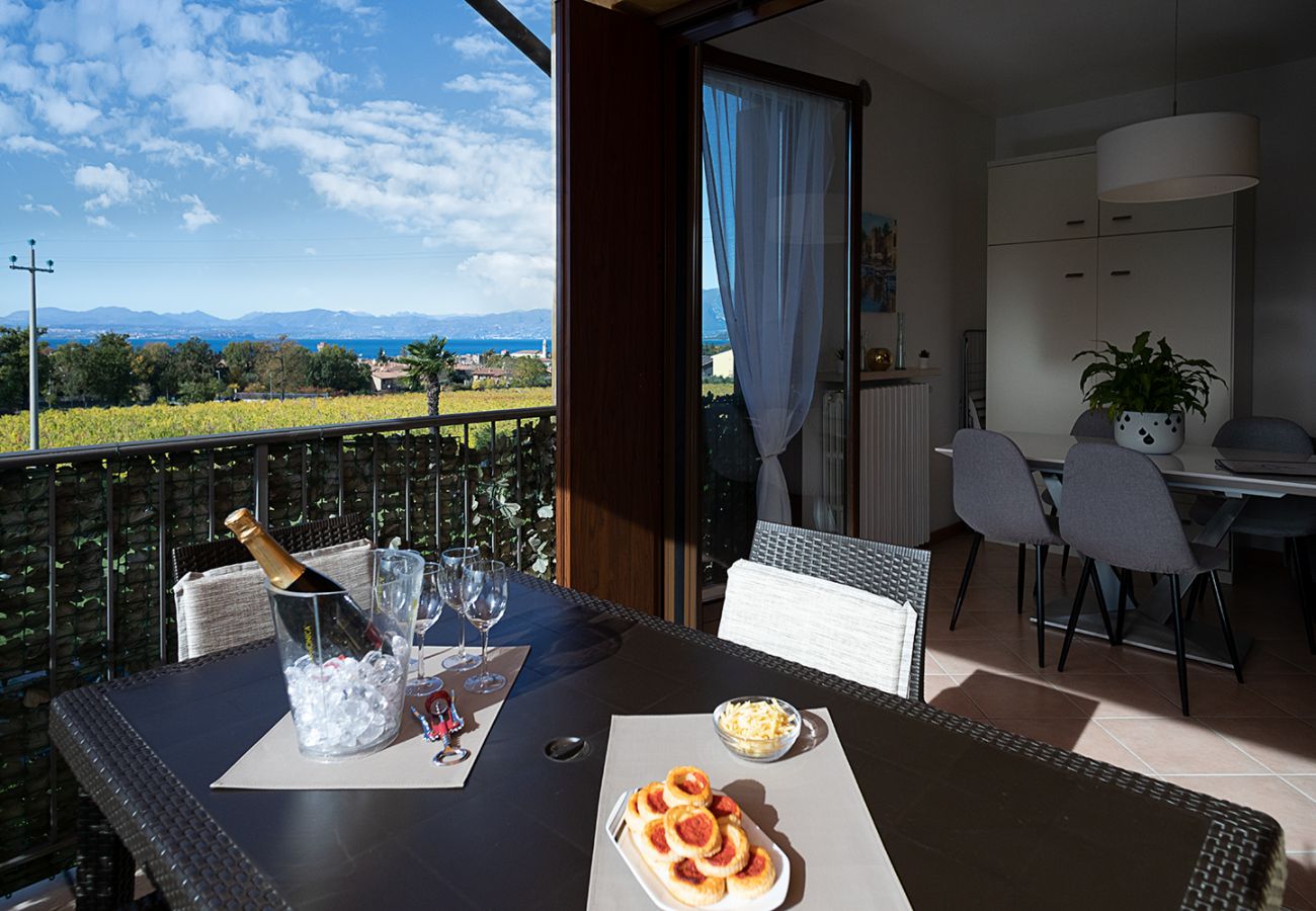 Ferienwohnung in Lazise - Regarda - Wohnung Blanco mit wunderschöner  Seeblick und Pool