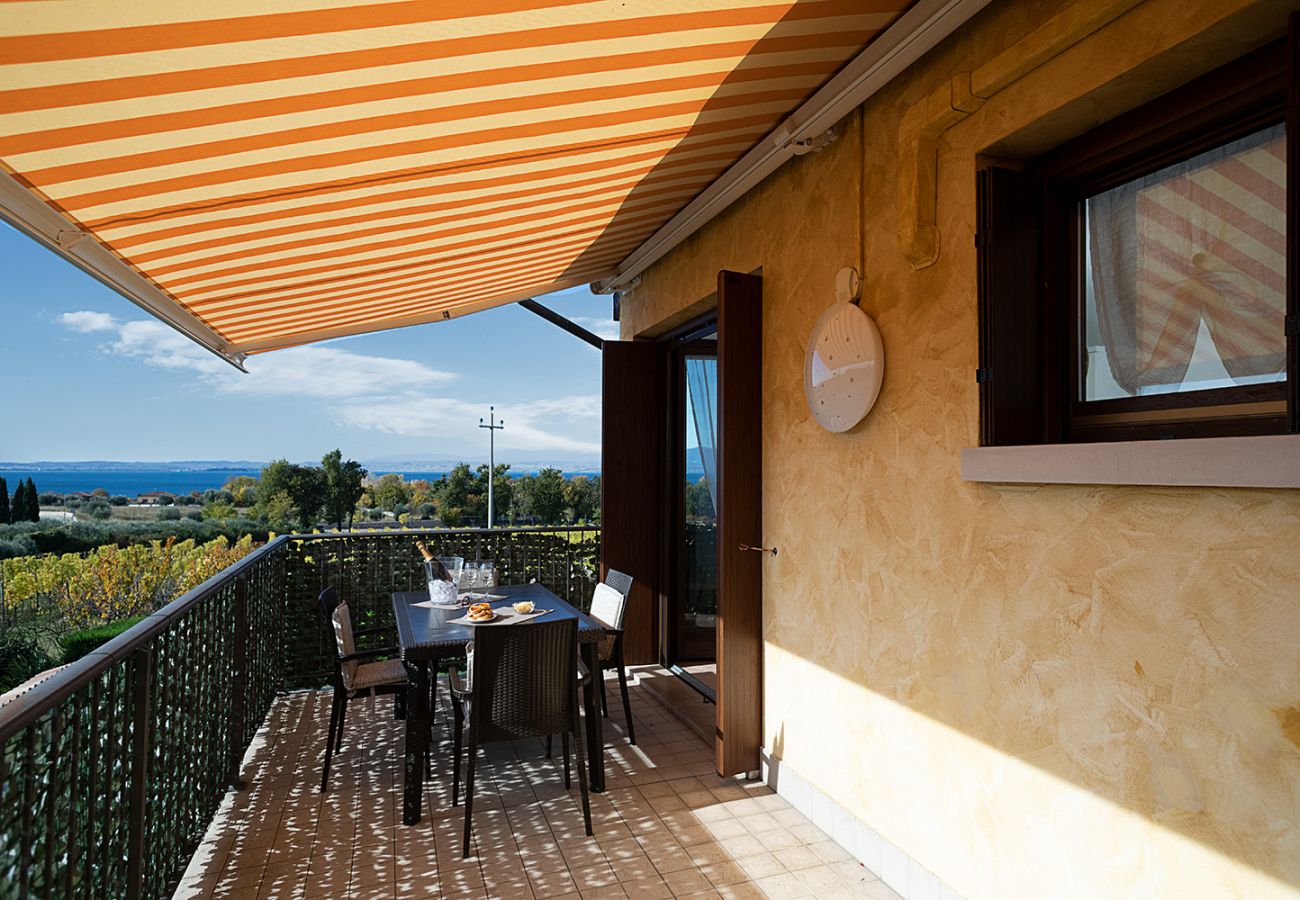 Ferienwohnung in Lazise - Regarda - Wohnung Blanco mit wunderschöner  Seeblick und Pool