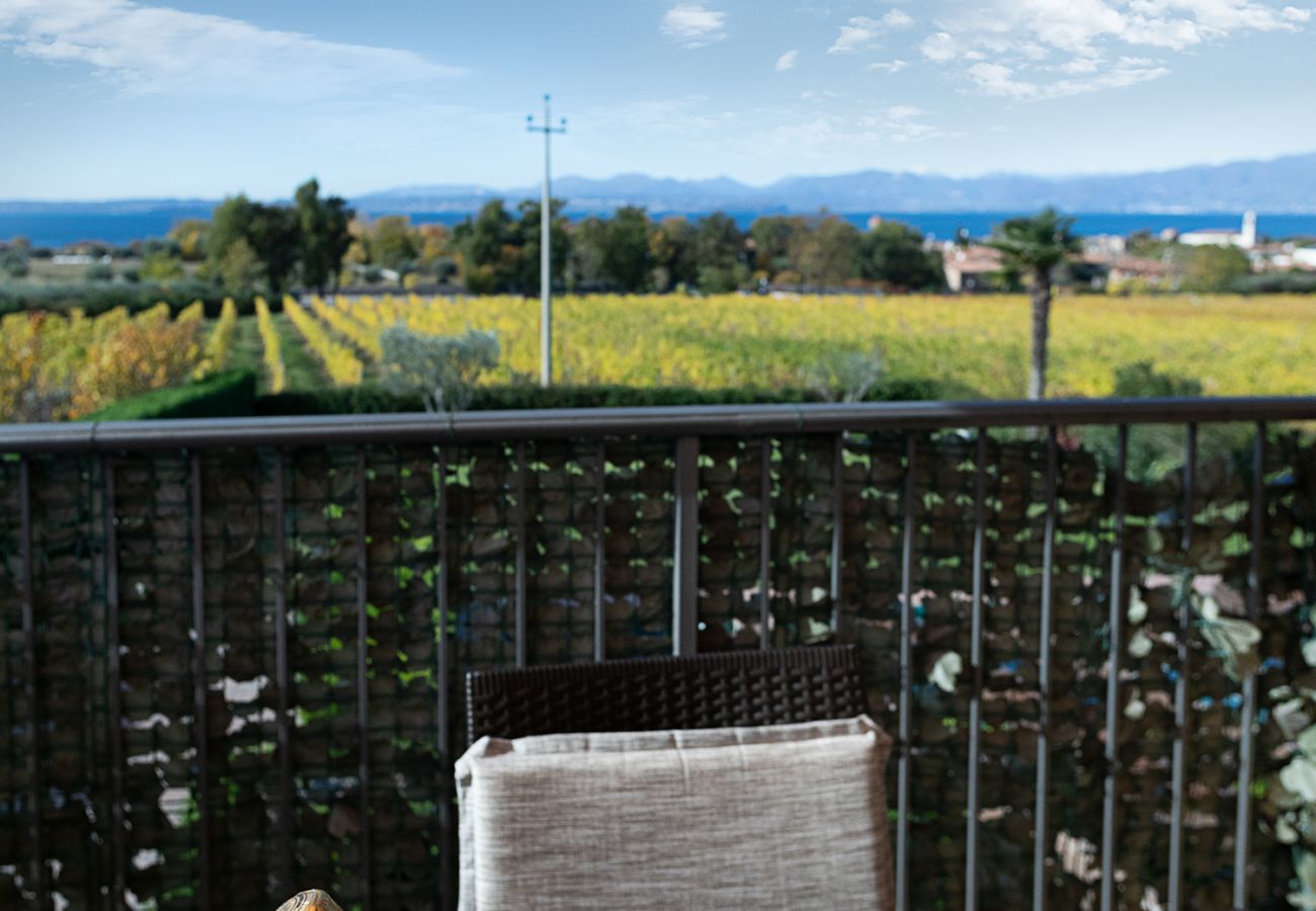 Ferienwohnung in Lazise - Regarda - Wohnung Blanco mit wunderschöner  Seeblick und Pool