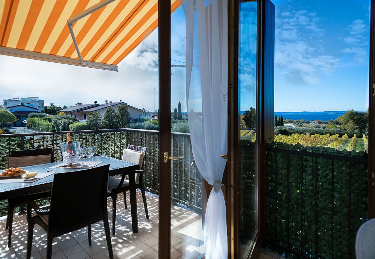 Ferienwohnung in Lazise - Regarda - Wohnung Blanco mit wunderschöner  Seeblick und Pool