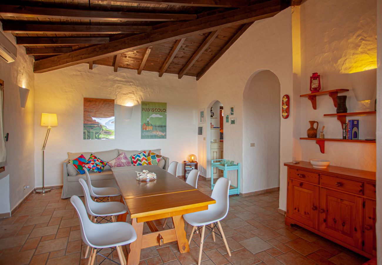 Villa Kalè - bright dining room with modern table and chairs, holiday villa