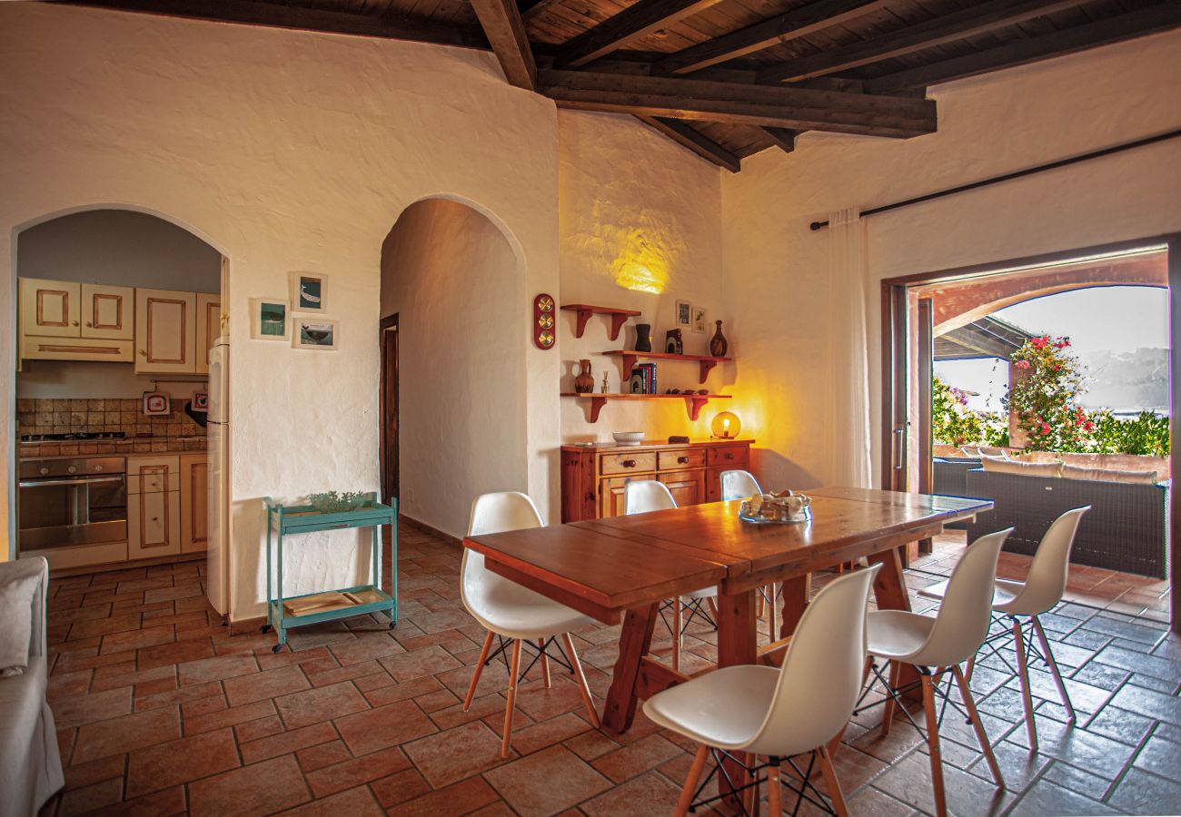 Villa Kalè - dining room with sea view, rental villa in Costa Corallina