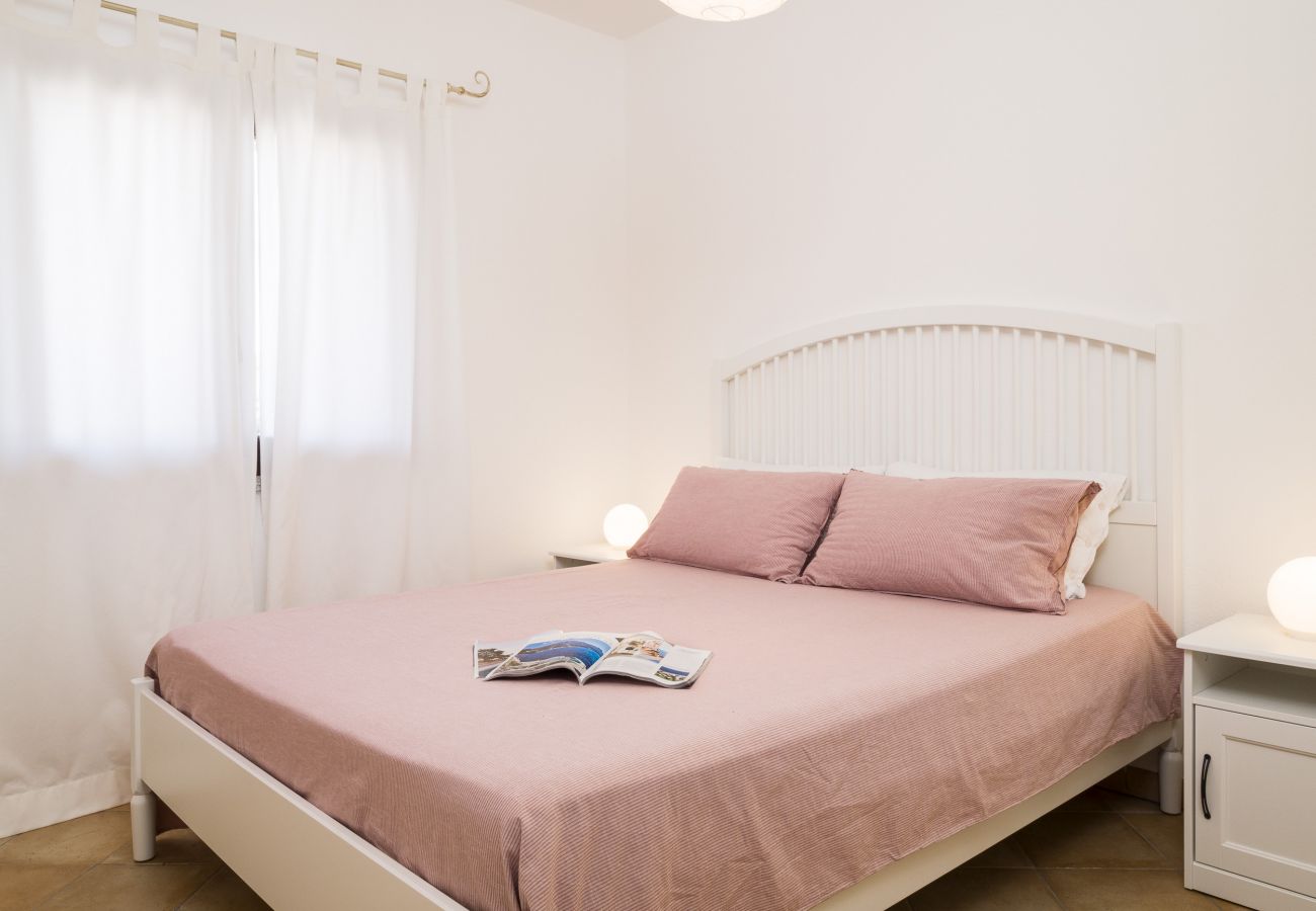 Myrsine 7S - Double bedroom in a holiday home near Porto Istana, Sardinia, perfect for a relaxing stay.