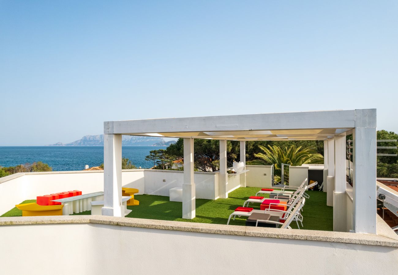 WLofts 14 - Solarium with sea view, pergola, and sun loungers, ideal for relaxation