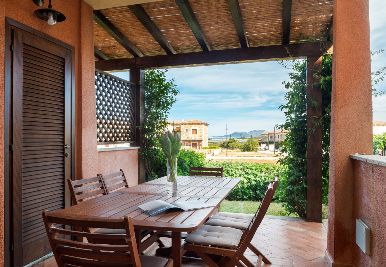 Myrsine 9D - Veranda with garden view, perfect for outdoor dining, holiday home in Sardinia