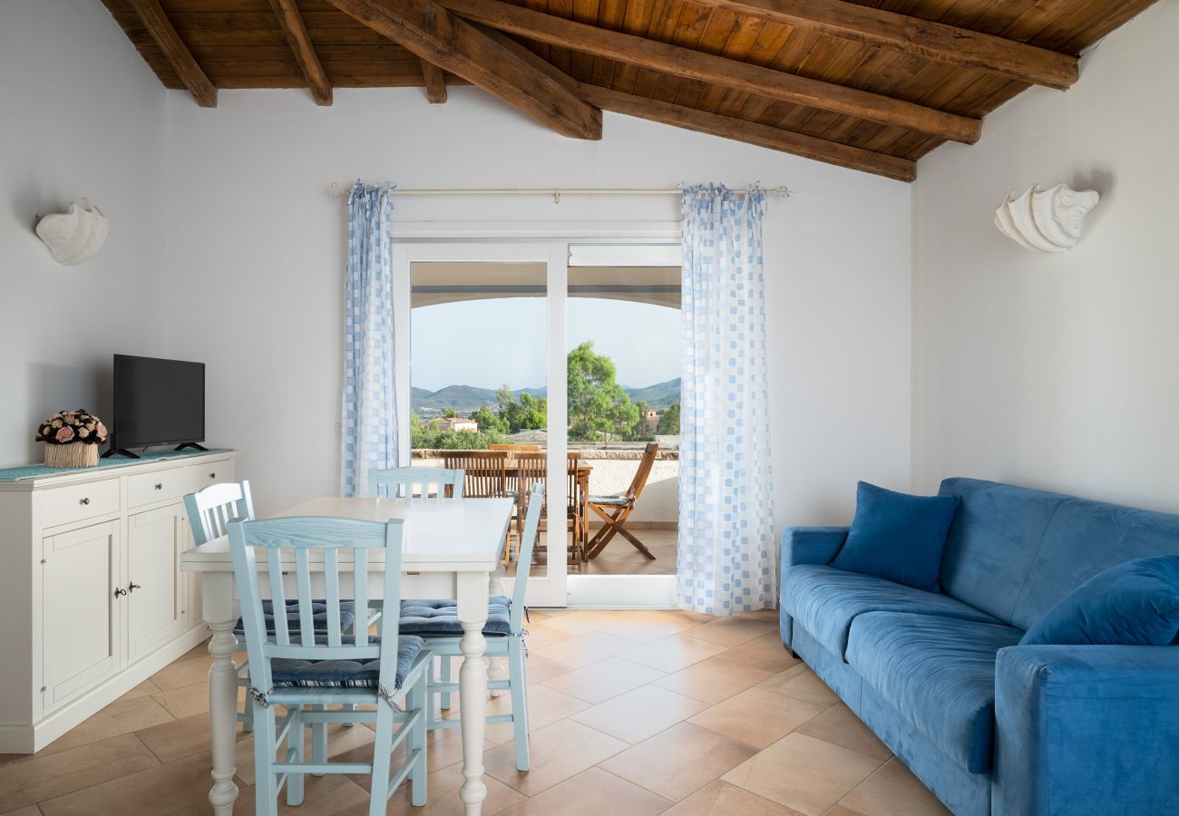 Villa Olive - Cozy living room with sofas and relaxation area, holiday home with private pool in San Teodoro, Italy